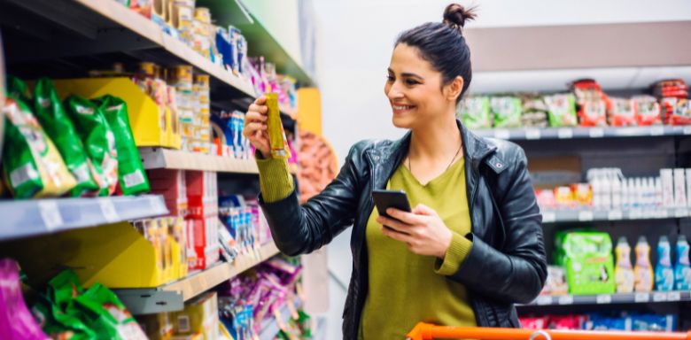 A woman shopping in a grocery store.